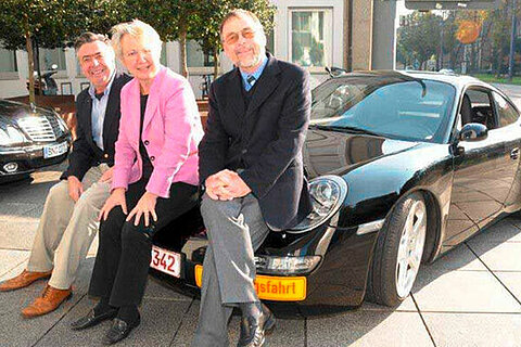 Dr. Peter Kulitz, Dr. Annette Schavan und Alois Ruf vor einem eRUF.